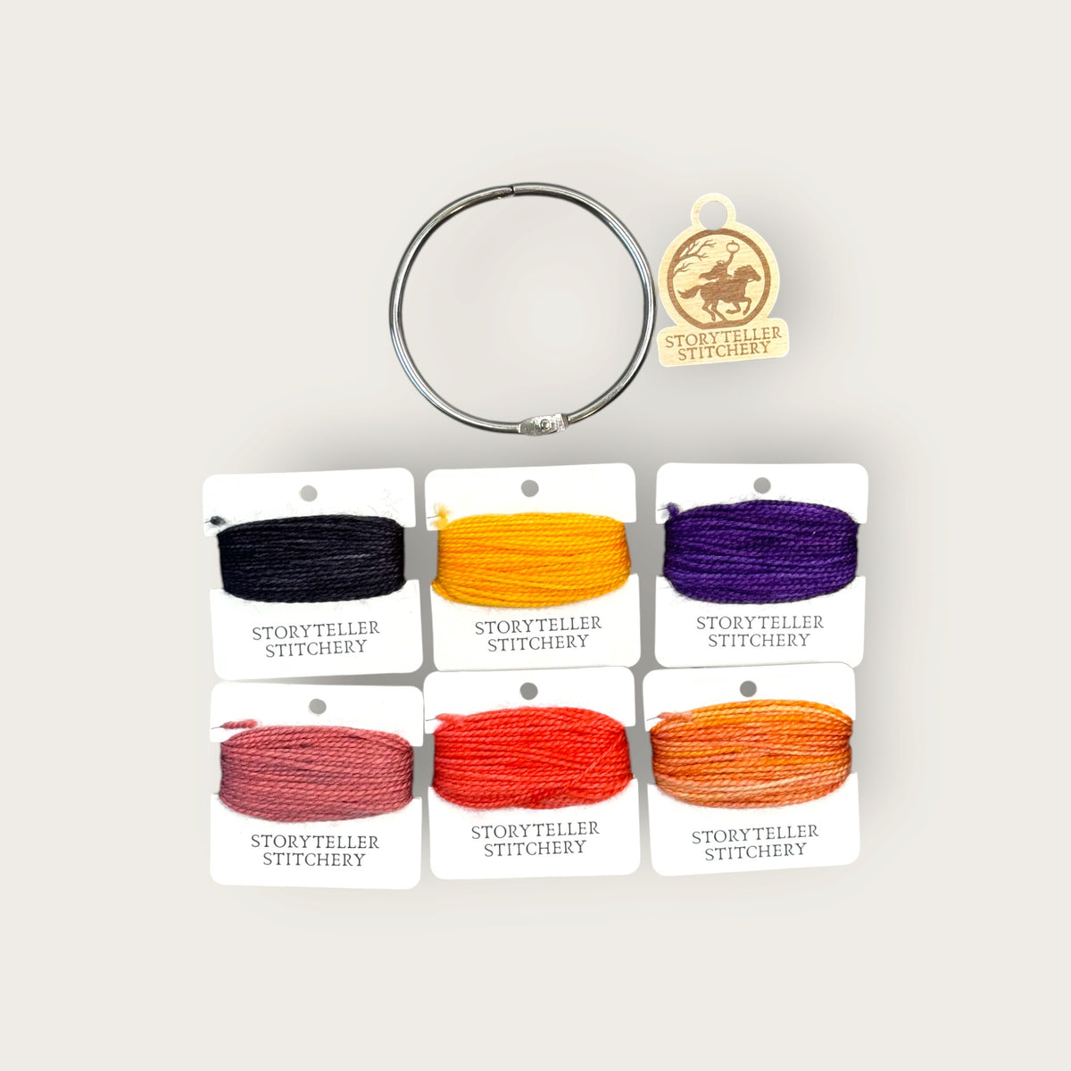 Headless Horseman Thread Set in Awen merino wool-silk: six hand-dyed thread cards in black, gold, purple, orange, and copper