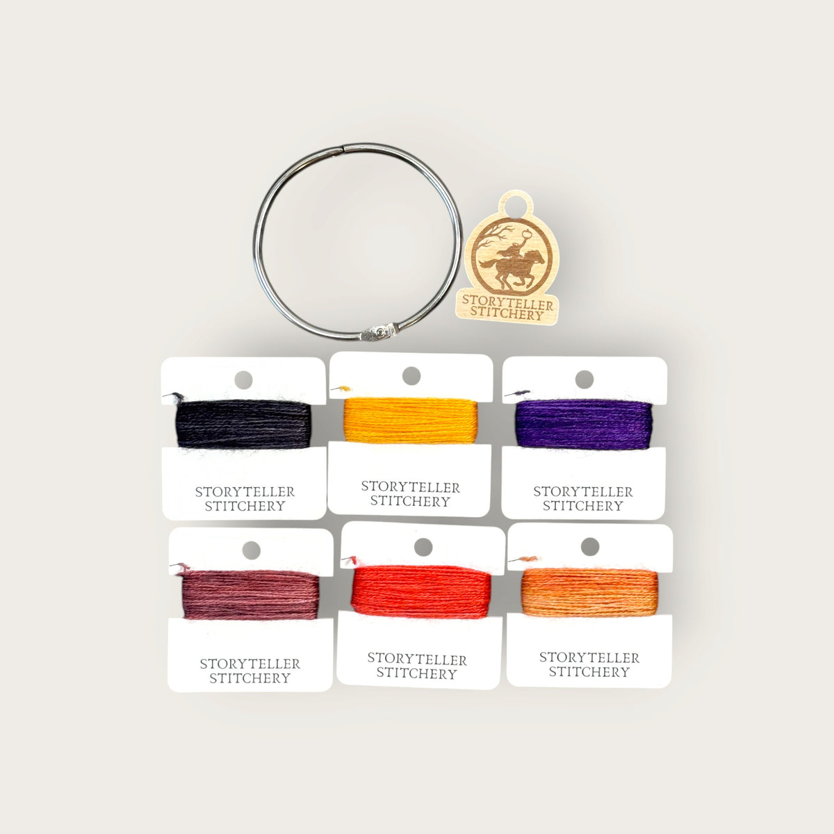 Headless Horseman Thread Set in Seren merino wool-silk: six hand-dyed thread cards in black, gold, purple, orange, and copper