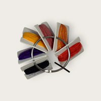 Headless Horseman hand-dyed thread cards in black, purple, gold, orange, and copper with a silver ring and horseman charm