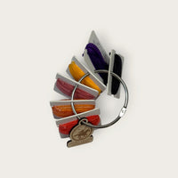 Headless Horseman hand-dyed thread cards in black, purple, gold, orange, and copper with a silver ring and horseman charm
