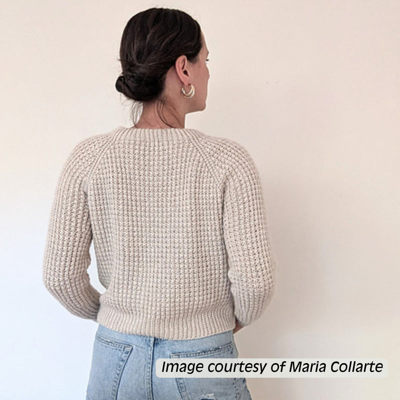 Maria Collarte wearing the Duna Crochet Sweater in Storyteller Stitchery Chronicle DK yarn, Return to Narnia Collection.