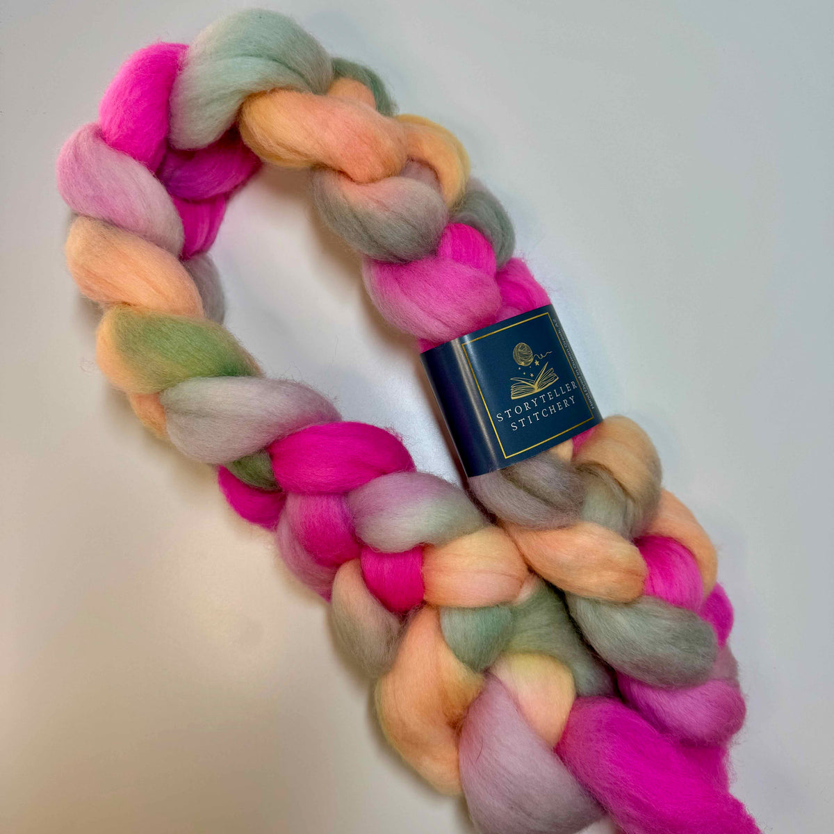 Hand-dyed spinning fiber braid in bright beachy summer colors, inspired by Happy Place by Emily Henry, shown in soft Merino roving.
